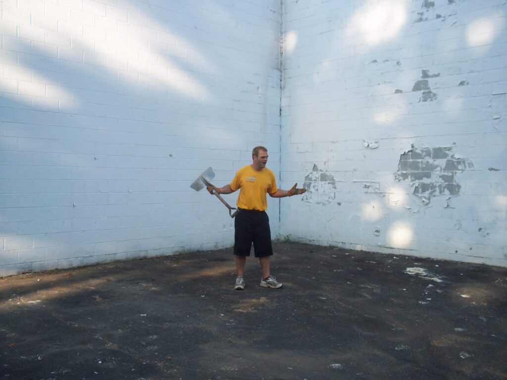 Junk Clean Up A clean alley after junk removal services from Stand Up Guys Junk Removal.