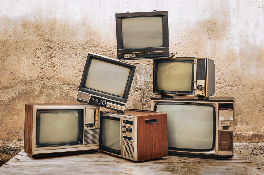 Old junk TV ready for Stand Up Guys Junk Removal to dispose of it properly.