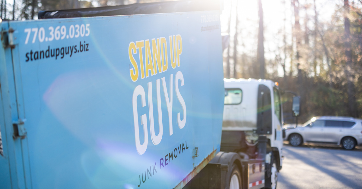 Stand Up Guys crew providing junk removal at a Brandon, FL property.