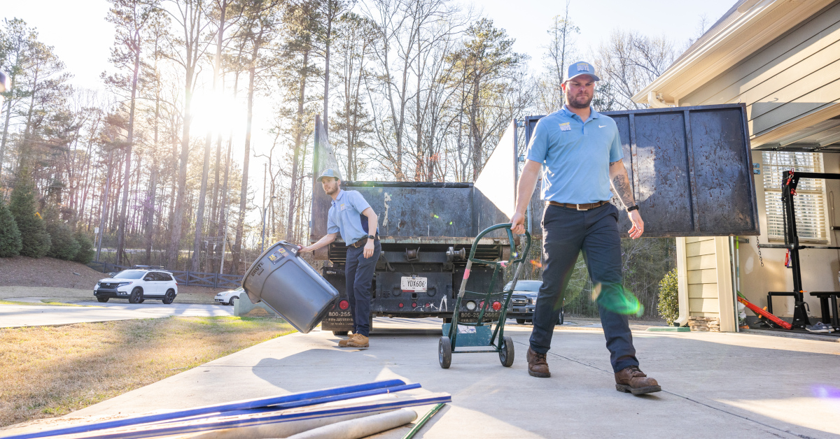 Stand Up Guys crew providing junk removal at a Largo, FL property.