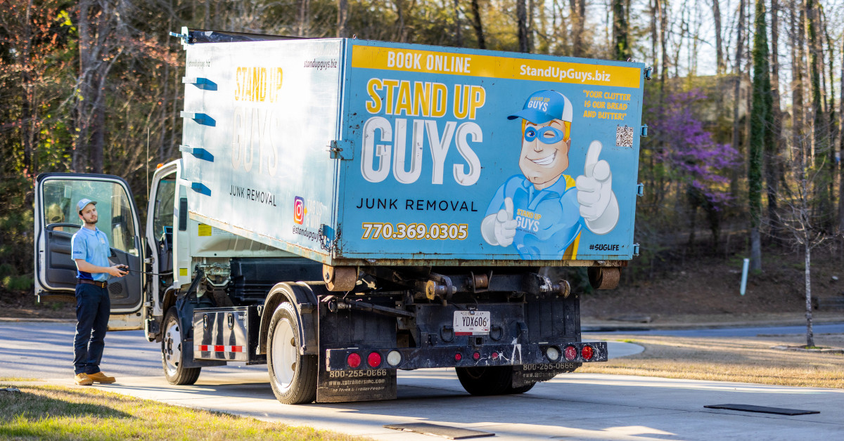 Stand Up Guys crew providing junk removal at a North Port, FL property.