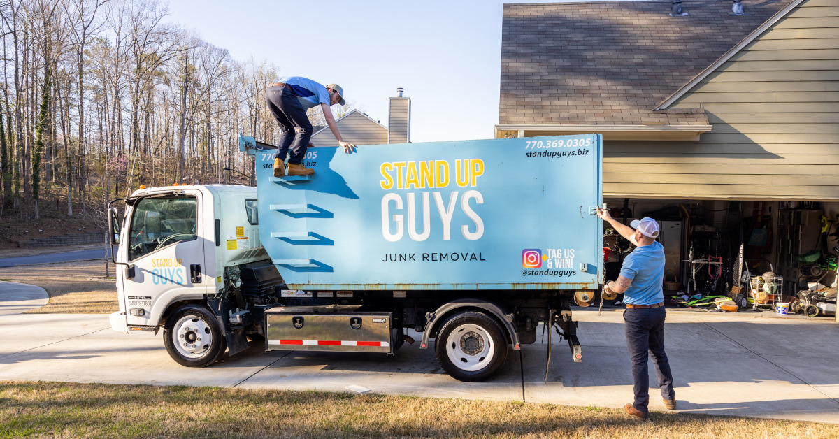 Stand Up Guys crew providing junk removal at a Venice, FL property.